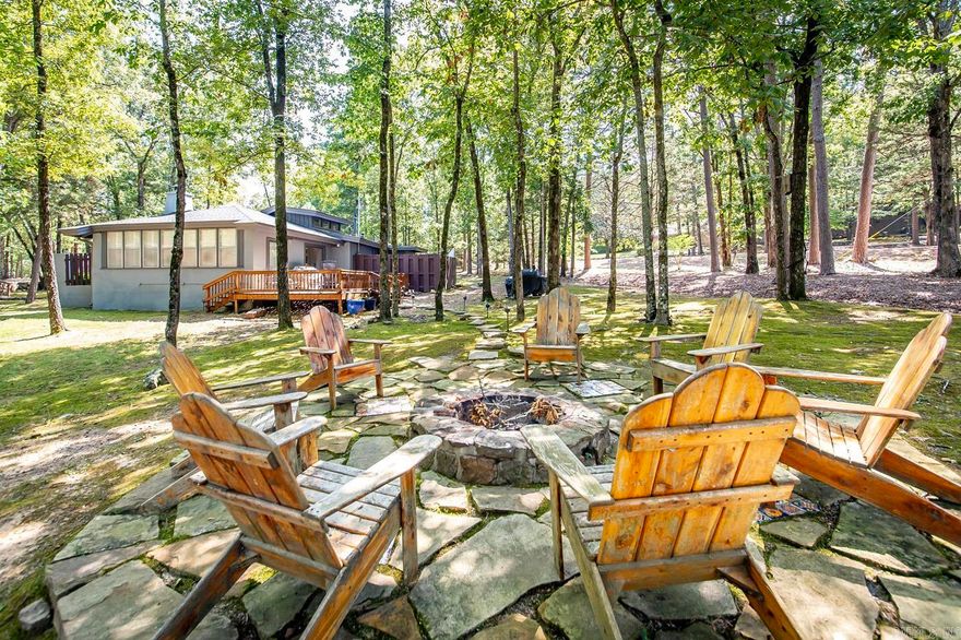 One of the original Cottages first built on Eden Isle. Home has beautiful private front entrance and comes fully furnished. Vaulted ceilings, exposed beams, 2 full baths, 2 bedrooms, Bunk room which could be a 3rd bedroom, wood burning fireplace, & fully equipped kitchen. Great winter views of the lake from the back deck and common path to the lake. Call today, this one won't last!