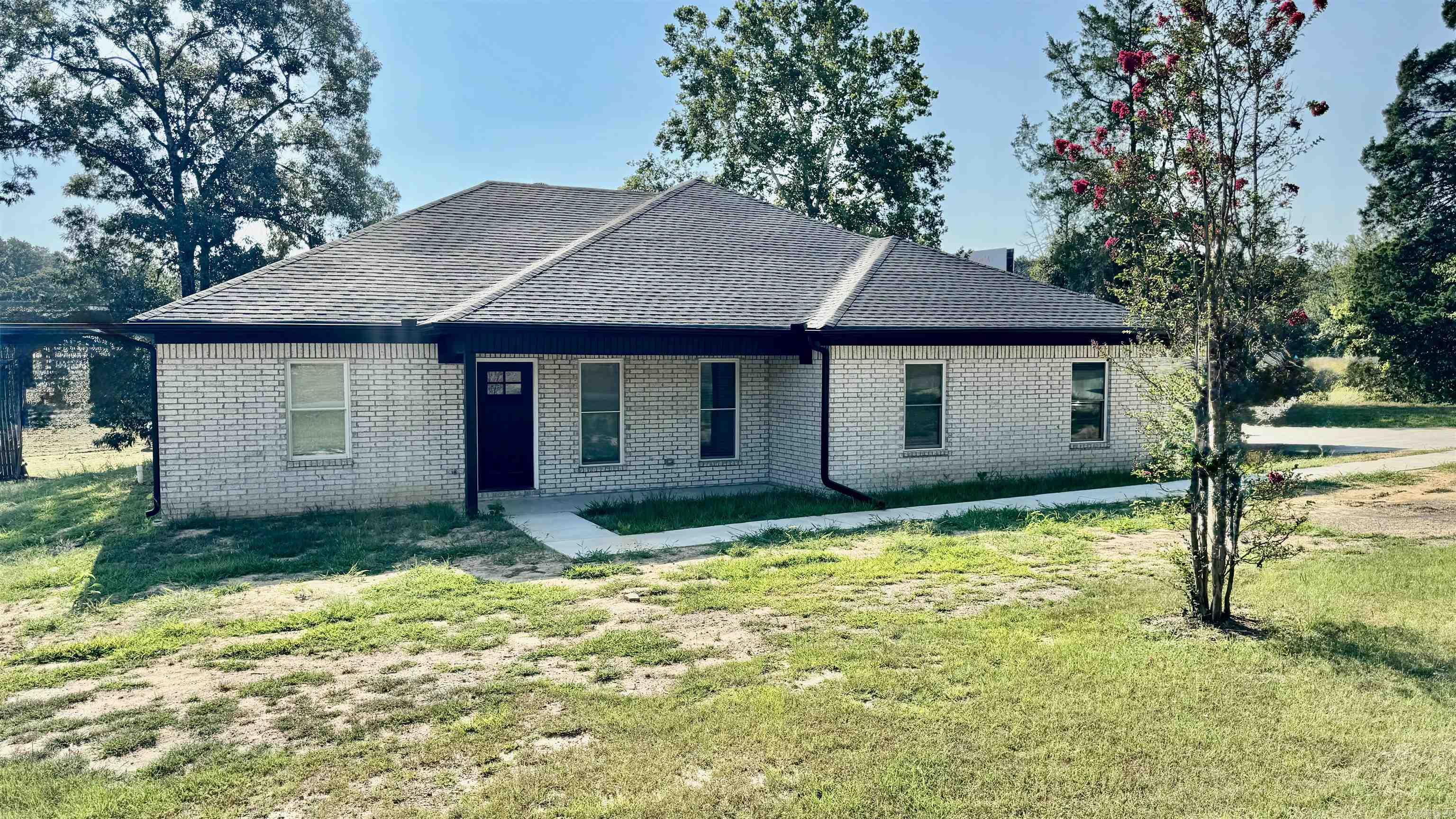 Beautiful new construction home nestled on 1.00 acre in a small established neighborhood just North of Greenbrier with a 24x30 SHOP!. Built in 2024, This 3bd/2ba offers a split floor plan, open-concept living. Kitchen has island w/ granite countertops, Stainless Steal appliances, open to living area with real wood flooring. The spacious primary suite features a large walk-in closet with a door to the nice covered deck. The primary bathroom has garden soaker tub and a tile walk in shower.Located in a rural neighborhood with easy access to nearby amenities, 2 car garage. Enjoy modern living with country charm - and it qualifies for 100% financing!