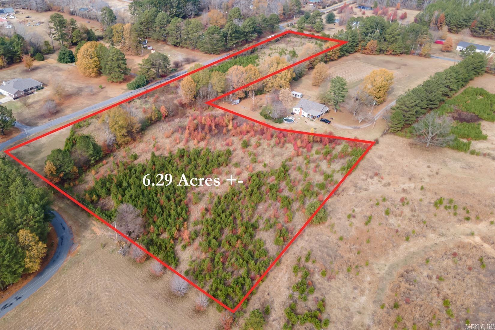 Ready to build your dream home?  This 6.29 acres would make the perfect spot for your dream home, barndominium or small farm.  Livestock allowed, outside city limits.  This rural property is perfect for your next project.