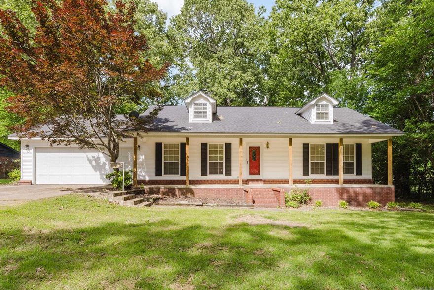 This charming 2BR/2BA one level home offers 1,414 SF of comfortable living with fresh paint throughout! Inside, you’ll find a functional layout with built-ins and extra storage, plus a spacious primary suite featuring a large walk-in closet and private bath. From the garage, you enter into a generous laundry/mud room. Outside you can enjoy relaxing on the large covered front porch accented with beautiful wood columns or on your back covered deck overlooking a spacious fully fenced-in backyard. There you will find a good sized storage building with electricity, offering endless possibilities for a workshop, mancave, or additional storage. Come see this one before it's gone!!