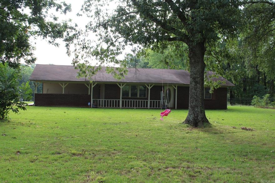 Brick home situated on approx. 37 acres offers 2 bedroom, 1 bath with approx. 1280 Sq.Ft. of living space.  Central A/C & Heat. 2 car carport.  Range/Microwave/Refrigerator/Washer-Dryer conveys with sell of home. Property has a 43 x 50 outbuilding.