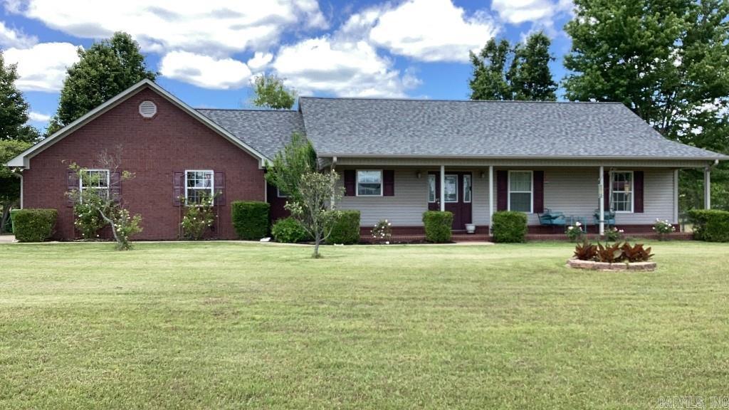 Charming Country Living on approx 20 acres Escape to peaceful rural living with this beautifully maintained 3 bedroom, 2 bath home nestled on 20 acres of scenic Arkansas countryside. Built in 2008, this 1900 square foot home offers a spacious, open floor plan perfect for family living or entertaining guests. Enjoy modern comforts with a large kitchen, walk-in closets, and ample natural light. Located just minutes from downtown Clarksville and Lake Ludwig, you will have the perfect blend of privcy and convenience.