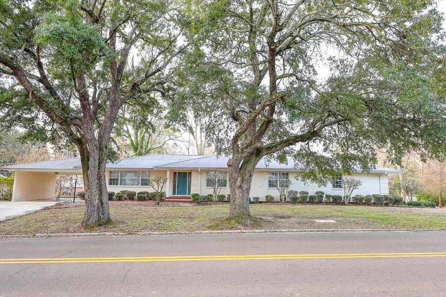 This spacious and versatile home offers 3 bedrooms and 3 full bathrooms on the main level, providing comfortable one-level living with room to spread out.  The walkout basement with a separate drive adds incredible flexibility, featuring a full apartment complete with kitchen, laundry, one bedroom, and one full bath. The basement also includes an additional living area and another full bathroom for even more usable space. And if you’d rather not take the stairs, simply use the elevator for easy access between levels.  Situated on .80 acres, the property includes a large workshop plus a separate heated and cooled workout room, perfect for hobbies, fitness, or extra storage.  A rare opportunity offering convenience, functionality, and flexibility, perfect for multi-generational living, income potential, or everyday comfort.  See attached floorplan sketch for square footage measurements.