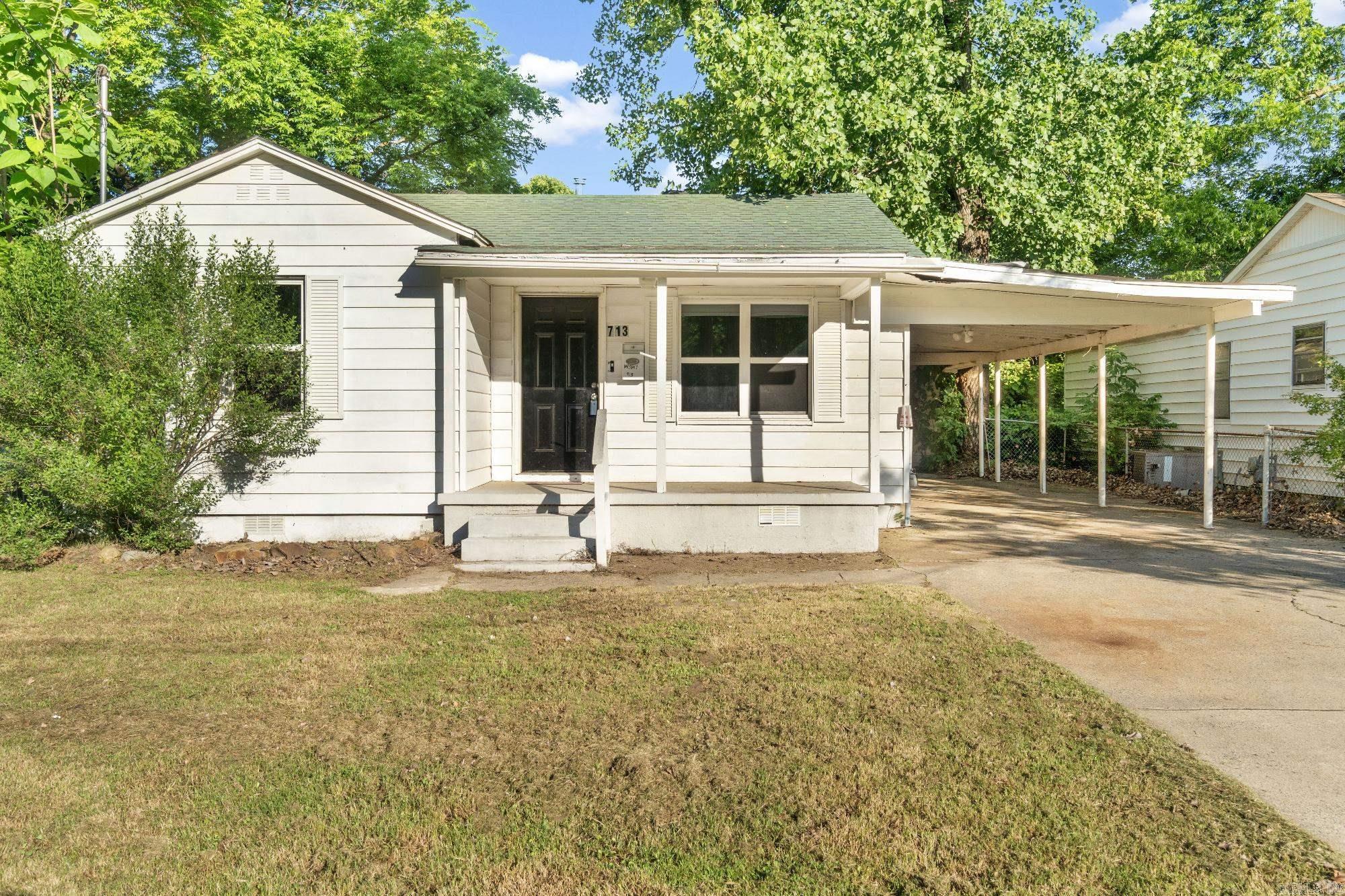 Attention investors! Don't miss this value-packed opportunity in Rich Acres! This 2 bed, 1 bath home offers 816 sq ft and is being sold AS IS, WHERE IS—seller will make no repairs. Recent updates include newer HVAC and updated vinyl flooring. Inside you’ll find a large kitchen, dedicated laundry area, and outside—a spacious fenced-in backyard, carport, and storage shed. Conveniently located near shopping, dining, and essential services. A smart pick for investors or buyers looking to add value!