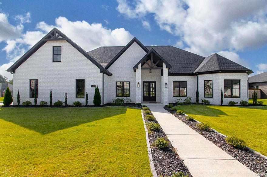 Welcome to The Pointe! Huge Corner lot!Room for a pool in the large back yard!  Level! All the bells & whistles! Every detail is covered! Beautiful! 4 bdrms on first floor. Big bonus up w/closet & full bath, could be 5th bdrm! Backbedroom down w/ensuite! Perfect for guests or that wonderful mother-in-law!Tall Ceilings throughout! 8 ft doors! Gorgeous moldings & tall baseboards! Butlers pantry could be coffee bar! All large rooms! Tons of storage! Beautiful Anderson windows! Quartz & granite in the kitchen! Pass through window for BQs! Kitchen cabinets have soft close drawers! Room for all the chefs on this huge island! Pantry! The light just floods the space! Only carpet upstairs! Covered back porch! Your going to LOVE it! Come see this fabulous home in the soon be be gated subdivision! 3 car garage is insulated! Sprinkler system! Tifway Bermuda! This one is very well built!3 complete HVAC systems! Foam insulation! Even electrical receptacles in the soffit for Christmas Lights! This builder has thought of everything!  Feels like HOME when you walk in the door! Come enjoy a tour today! Taxes reflect lot only.
