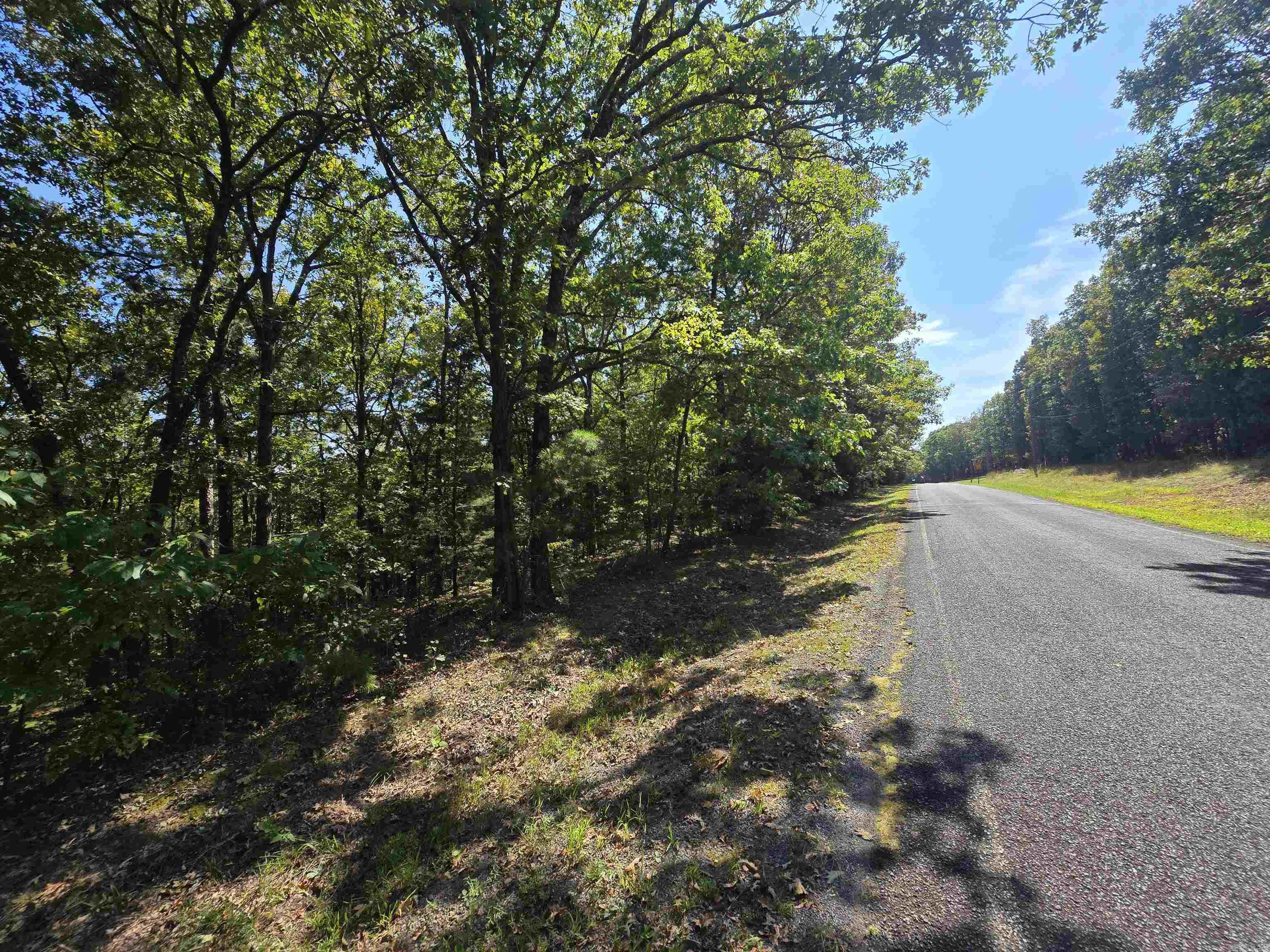 Discover the perfect opportunity to create your dream home or weekend getaway in the charming Ozark lake town of Fairfield Bay, Arkansas. This residential lot provides plenty of space to design and build the home you've always envisioned. Situated just minutes away from the Fairfield Bay Marina and Greers Ferry Lake, you'll have access to endless water-based activities such as boating, fishing, swimming, Fairfield Bay also offers 3 communities pools, mini golf, bowling, restaurants, hundred miles of ATV & hiking/biking trails and so much more Embrace the tranquil atmosphere and breathtaking natural beauty of the Ozarks as you design you forever home or plan your weekend retreat. Don't miss out on the chance to be part of this lake town community, where the beauty of nature merges seamlessly with modern amenities and a relaxed lifestyle. Possible Owner finance.