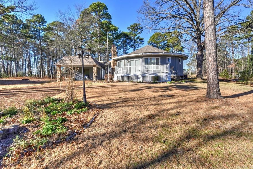 Welcome to your new oasis.  Located on Indian Hills Golf Course, this charming home offers a unique opportunity to create your dream residence. Nestled amidst the lush greenery, this property features a green house, perfect for those with a passion for gardening or growing your own organic produce. Additionally, a separate storage building provides ample space to store all your outdoor equipment, ensuring a clutter-free home .One of the standout features of this home is the heated & cooled sunroom, providing year-round enjoyment & serving as the perfect spot to relax & unwind while soaking in the beautiful views of the golf course. Golfers will relish the convenience of having this stunning course right in their backyard. Whether you're a golf enthusiast or simply enjoy the peaceful serenity that comes with living on a golf course, this location offers the best of both worlds.  Explore the Bay's enchanting surroundings, where Greers Ferry Lake is 10 minutes away. Other amenities include: Pickle ball courts, 3 swimming pools, tennis courts, hiking trails, 80 miles of atv/utv trails, golfing, and bowling.  Come check this one out before it's gone. See agent remarks