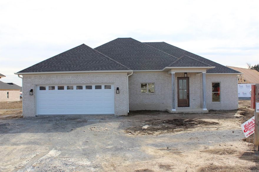 Another amazing Kyle Berryman Home!  The builder has thought of everything!   Charming three-bedroom, two-bathroom home featuring a luxurious primary room with a double sink and custom shower. Enjoy convenience with a primary closet that walks through to the adjacent laundry room. Abundant storage throughout, complemented by energy-efficient LED lighting. This new construction boasts modern amenities, including a built-in table attached to the kitchen island, a cozy gas fireplace, and a covered porch for outdoor relaxation. Experience the perfect blend of functionality and style in this thoughtfully designed home.  Within minutes of shopping and restaurants.  Greenbrier schools!