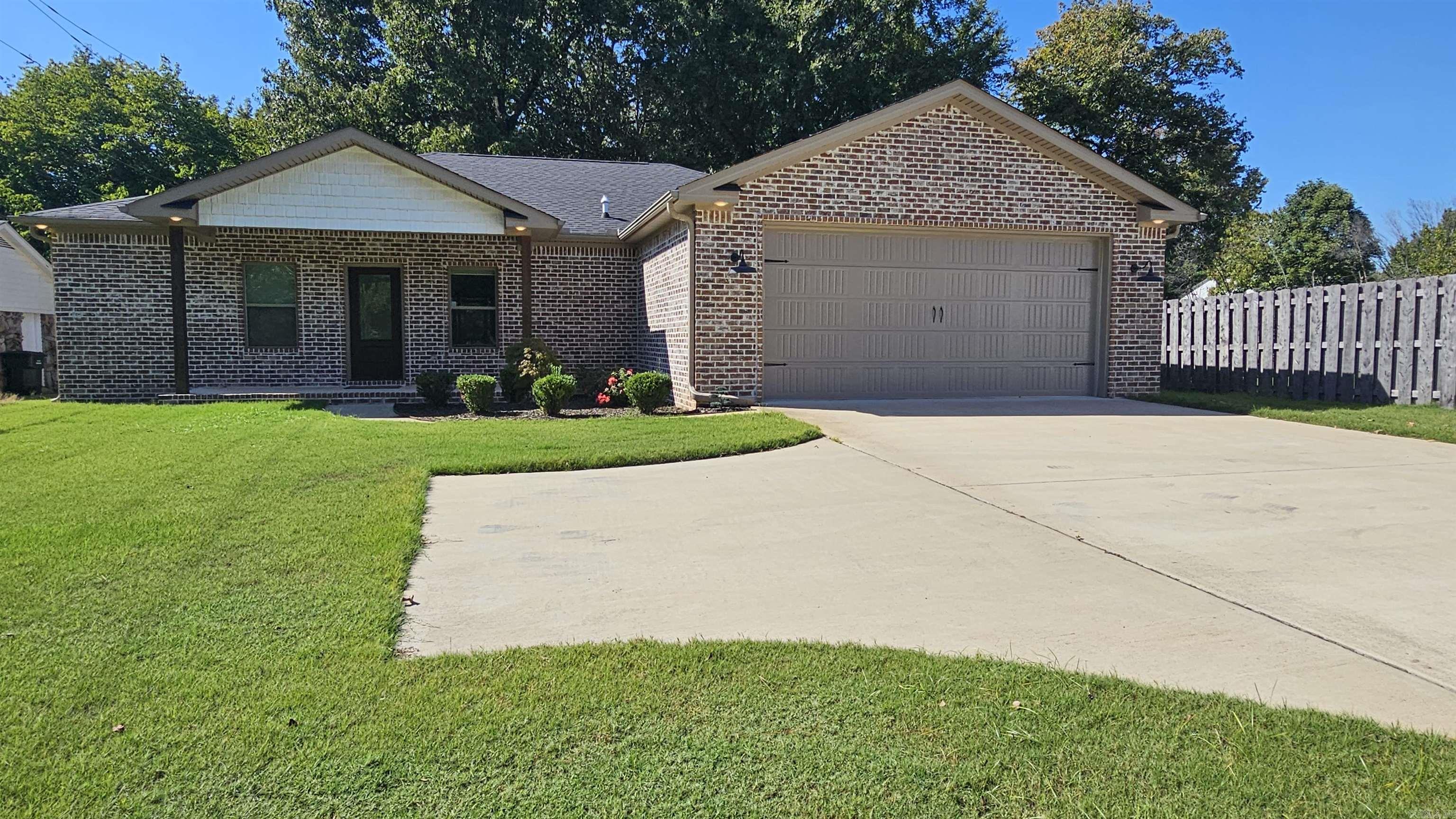 Better Than New! Stunning 3 Bed, 2 Bath Home in the Heart of Jonesboro. This home has been meticulously maintained and upgraded! The open floor plan is perfect for entertaining & daily living! The spacious kitchen features gorgeous granite countertops, lots of cabinetry, and distressed subway tile backsplash and offers plenty of space to cook and gather! The primary suite features a luxurious custom tile shower and soaker tub for that spa-like experience! Enjoy the tree shaded back yard from the screened porch or back deck. Both are perfect to relax and enjoy your morning coffee or evening breeze in total comfort!