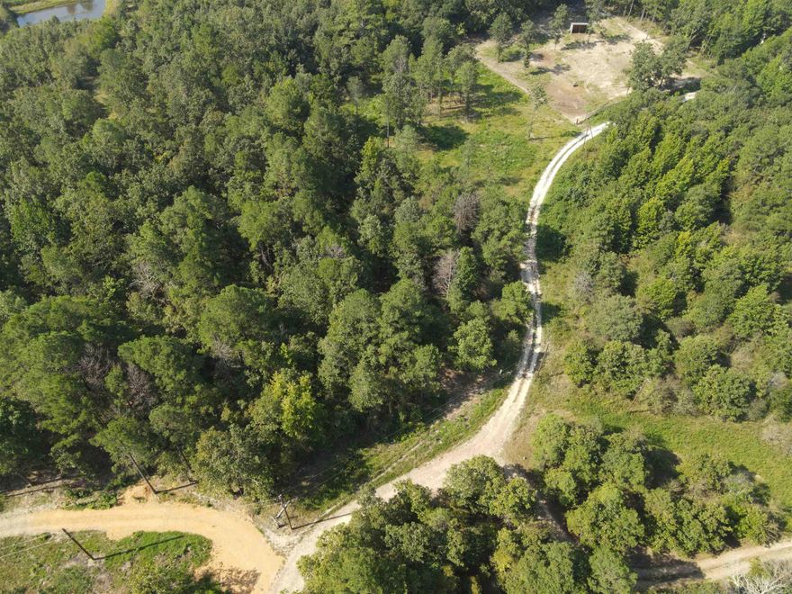 Peace & tranquility is what you’ll enjoy with this 3.72 acres, located in the secluded Ponderosa community, just 10 minutes from Lake Degray and 20 minutes from Hot Springs. The property offers plenty of privacy with mature trees and has several home sites with one site already cleared. Live off grid or connect to electric, Kimzey water & CATC fiber optic at the road. Various wildlife spotted in the area includes deer, ducks, geese, turkey and bald eagles. Nature’s calling you. Grab your Builder and House Plans and schedule your appointment today!