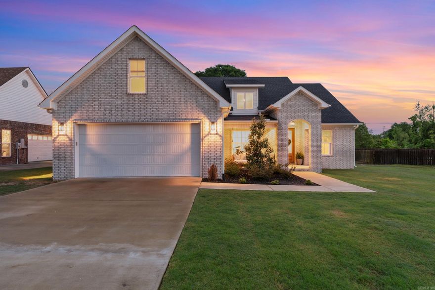Welcome to your own private oasis in the Plantation subdivision in Mayflower—just 10 minutes to Maumelle and 20 to Conway. This 4 bed, 2 bath home sits on a highly desirable lot backing to the neighborhood walking trails and a peaceful pond, giving you the feel of endless backyard views. Inside, you’ll love the custom finishes throughout and open-concept layout featuring a gourmet kitchen, spacious living area, dining space, soaring ceilings, and a huge pantry.  The primary suite is a showstopper with an oversized bedroom and spa-like bath offering separate vanities, soaking tub, custom walk-in shower, and a massive closet. Bonus: the bathroom connects directly to the laundry room and mud bench hallway for ultimate convenience. Upstairs features a versatile bonus room with closet—perfect for the 4th bedroom, office, or game room. Step outside to your covered patio + extended patio, all overlooking the pond—your own backyard retreat. Whether on the front porch swing or back patio, this home was made to enjoy every moment.