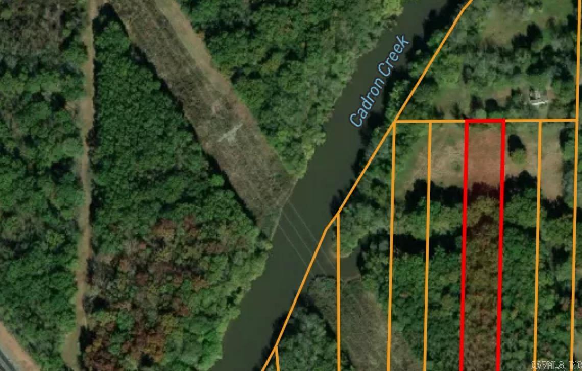 Unrestricted 3.75 acre lot. Suitable for a home, manufactured home, or livestock. Partially cleared. 4 miles from Conway. It appears to have access granted by easements.