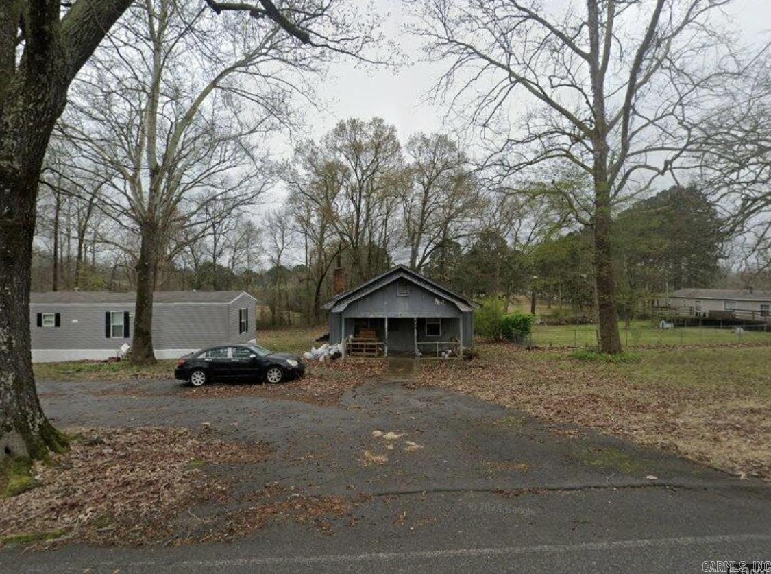 Over 1 acre with older home needing major renovations plus newer single wide mobile home. Investors come look.