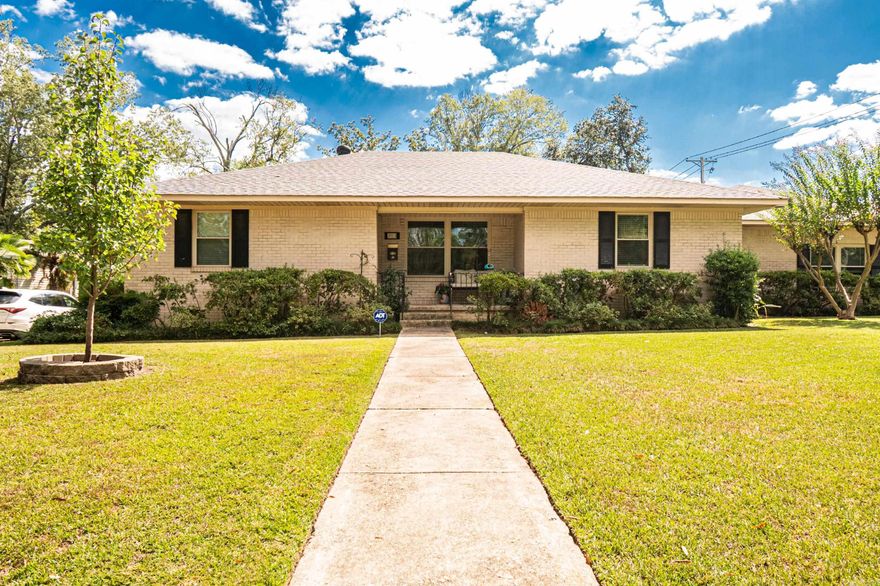 This 3-bedroom, 2-bath home is full of character and updates you’ll love. Set on a .34-acre corner lot, it offers great outdoor space with a new privacy fence, landscaping, and a lovely screened-in porch—the perfect spot to enjoy your mornings or unwind in the evenings.  Inside, the charm really shines through with beautiful original hardwood floors, a freshly painted living room, and a dining room highlighted by a new chandelier. With both a formal living room and a cozy den, you’ll have plenty of space to relax or entertain.  Recent updates like the new roof, 2019 hot water heater, and thoughtful improvements make this home move-in ready, all while keeping its warm and inviting character.  If you’re looking for a home that blends classic charm with modern comfort, 703 E. 8th is waiting for you!