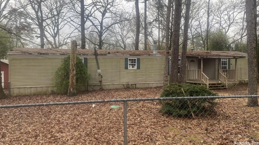 A total of 1.94 acres goes with this 3 BR, 2 BA home! It has a nice sized living room with an electric log fireplace, a kitchen equipped with stove, microwave, dishwasher and pantry as well has a primary bedroom split from the other with a private bath! Two storage buildings are on the property. Agents please read Agent Remarks, and be aware that a survey, disclosure and legal description are available through associated documents.