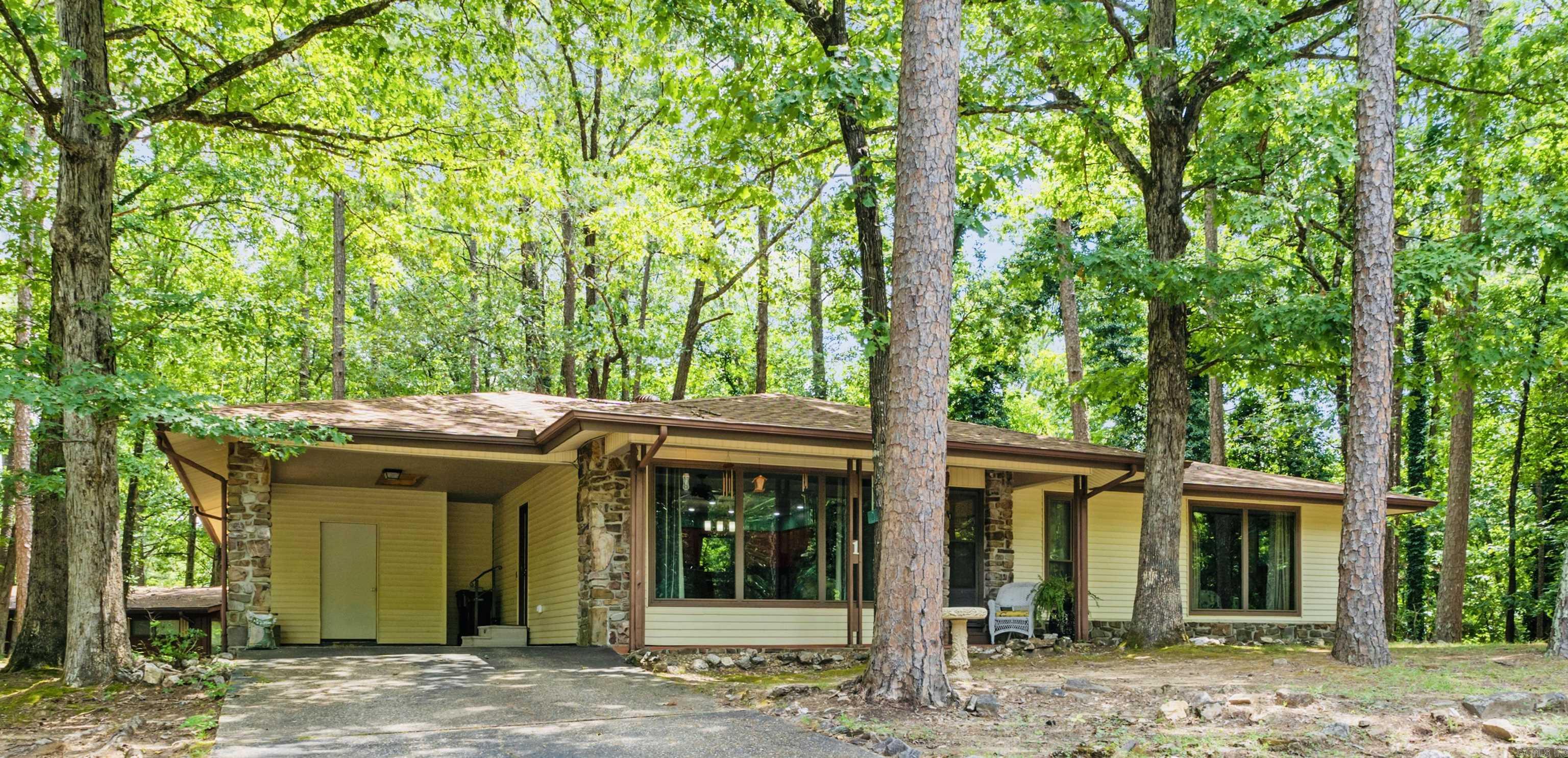 Discover this inviting home on the desirable West side of Hot Springs Village! Tucked on a spacious corner lot, this property blends modern updates with cozy charm. Among the key Features are all newer windows and newer roof for peace of mind. Stylish stainless-steel appliances in the kitchen. Updated baths. Open floorplan with a generously sized family room/den and a classic wood-burning fireplace. Handy bonus storage roomāperfect for your hobbies, gear, or seasonal dĆ©cor! Fenced backyard ideal for pets, play, or gardening. Whether youāre downsizing, investing, or embracing the Village lifestyle, this home offers both function and warmth. Come see it before itās goneāyour future starts here.