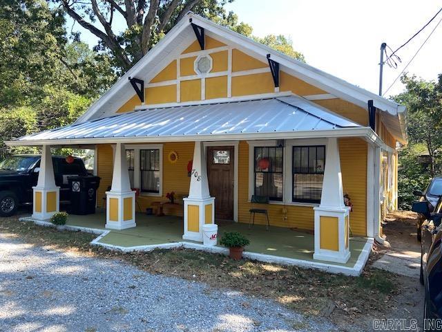 UPDATED CUSTOM HOME FROM THE 40'S!! If you love the craftsmanship from 1940 but enjoy the amenities of 2023, this home is for you! The contractor used as much of the original as he could but w/modern updates. Home is 1540 sq ft with 3br/2ba. The contractor added all of the following new: roof framing, roof, gutters w/guards, foam sheeting, spray foam insulation in attic and exterior walls, electrical, 200 amp meter, breaker box, breakers and wiring, plumbing, LVP flooring, stairs, carpet, C/H/A and ductwork, custom kitchen cabinets, countertops, induction cooking range, double drawer dishwasher, sheetrock, septic line to city service, covered back deck, architectural posts, metal exterior doors, can lighting, built in laundry room w/stacked washer and dryer and storage, tiled tub enclosure and custom walnut wash stand in bathroom! New master bath w/walkin shower. Original features include some light fixtures, interior doors and glass doorknobs, windows, archways and Hoosier kitchen cabinet! Under house storage room. Sits on .14 of an acre for easy yard maintenance. City utilities. Beautiful well thought out home! Walking distance to Historic Downtown Pocahontas!