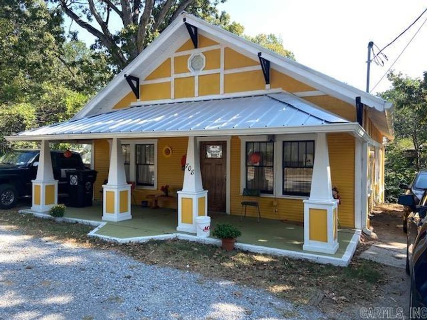 UPDATED CUSTOM HOME FROM THE 40'S!! If you love the craftsmanship from 1940 but enjoy the amenities of 2023, this home is for you! The contractor used as much of the original as he could but w/modern updates. Home is 1540 sq ft with 3br/2ba. The contractor added all of the following new: roof framing, roof, gutters w/guards, foam sheeting, spray foam insulation in attic and exterior walls, electrical, 200 amp meter, breaker box, breakers and wiring, plumbing, LVP flooring, stairs, carpet, C/H/A and ductwork, custom kitchen cabinets, countertops, induction cooking range, double drawer dishwasher, sheetrock, septic line to city service, covered back deck, architectural posts, metal exterior doors, can lighting, built in laundry room w/stacked washer and dryer and storage, tiled tub enclosure and custom walnut wash stand in bathroom! New master bath w/walkin shower.  Original features include some light fixtures, interior doors and glass doorknobs, windows, archways and Hoosier kitchen cabinet! Under house storage room. Sits on .14 of an acre for easy yard maintenance. City utilities. Beautiful well thought out home! Walking distance to Historic Downtown Pocahontas!
