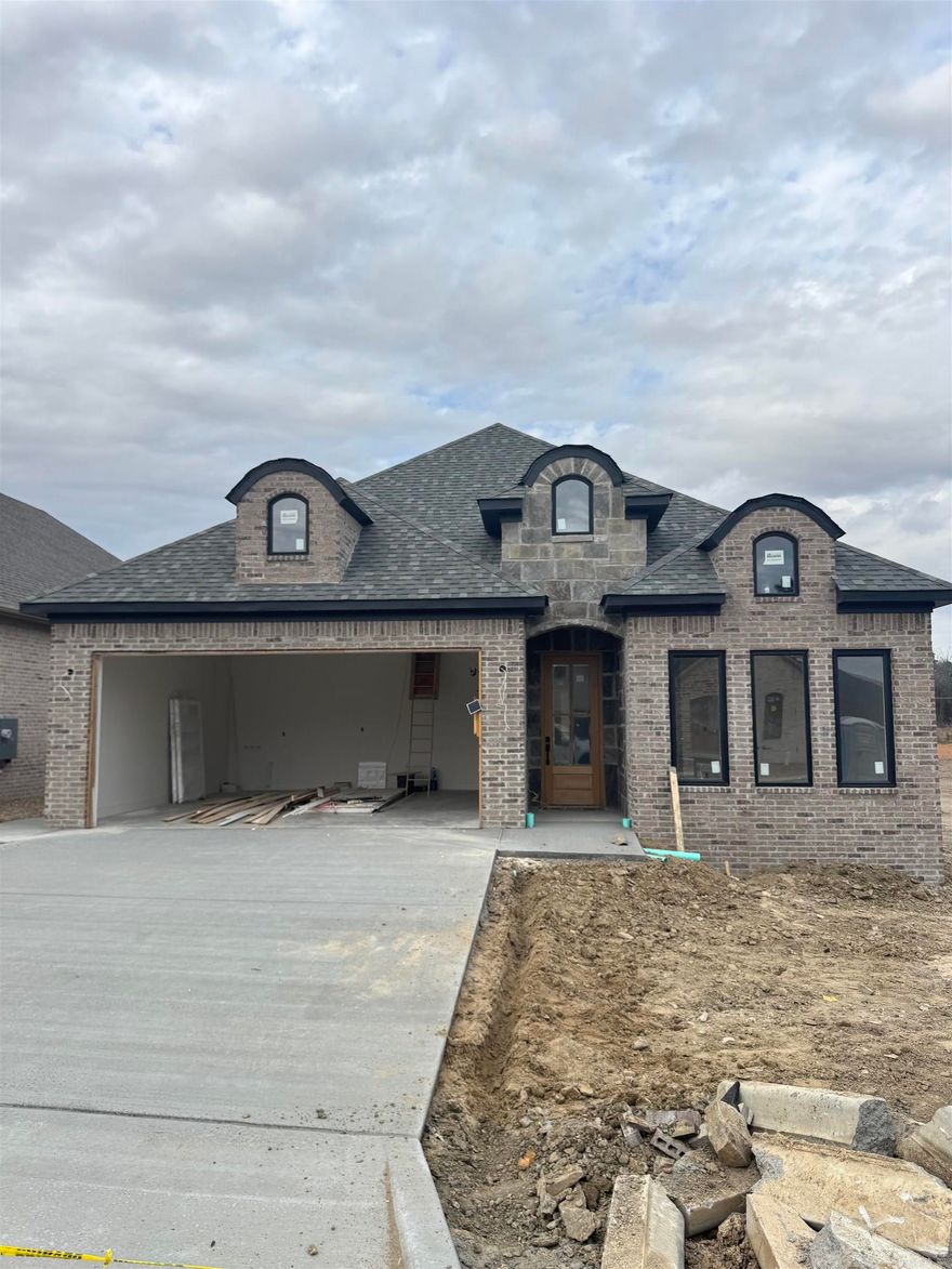 We're excited to introduce Mountain Brook, West Little Rock's newest and most desirable neighborhood. This community is conveniently located off Highway 10, just behind The Ranch and the Bank OZK campus, and only minutes away from Little Rock Christian, Joe T. Robinson, and Don Roberts Elementary.  This plan is a fan favorite: single-level residence, which beautifully combines craftsmanship and design. This home features four bedrooms and two baths with an effortless, thoughtful layout. The fourth bedroom offers great flexibility, perfect for a home office or other creative space. The primary suite is a true sanctuary, boasting a spa-like bath with a soaking tub, an oversized walk-in shower, and a custom-designed closet. The heart of the home is a chef’s kitchen, complete with quartz countertops and custom cabinetry, seamlessly connected to a fully functional pantry. Call listing agent to tour home.  This home is set to be complete in April 2026.