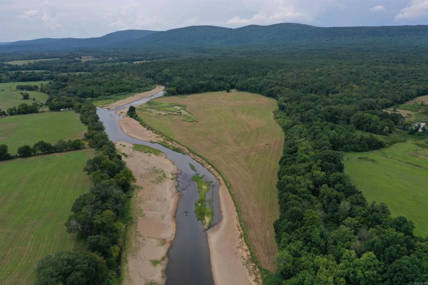 The beautiful waters of the Ouachita River are some of the most sought after in the region, being known for their great recreational opportunities. This 40 +/- Acres just outside of Oden boasts just over a quarter of mile of frontage on the Ouachita River, along with 1100 +/- feet of boundary with the Ouachita National Forest. Along with these hard-to-find amenities, the property also has two full camper hookups.  • 40 +/- Acres • 1450 +/- Feet of Ouachita River Frontage • 1100 +/- Feet of Ouachita National Forest Boundary • Power, drilled well, and septic all on property • Two Full-Service Camper hookups • Storage building with power • Additional Water and Septic Hookups • Hilltop Build site • Mixture of Timber and open fields • Great Hay Meadow • Easy Access to River • Great Mountain Views • Phenomenal Floating and fishing opportunities • Shirley Creek Recreation Area nearby • Deer Hunting • Minutes from Oden • 20 minutes from Mount Ida • 35 Minutes from Mena • 1 hour and 10 minutes from Hot Springs