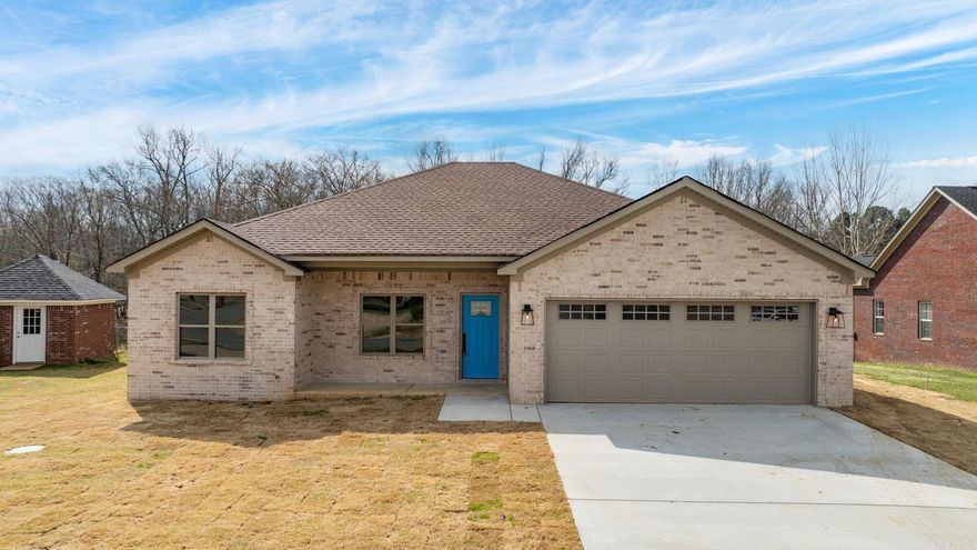 You absolutely will not find a more quiet spot with a brand new home! This home is now occupying one of the only lots left in the popular Wilhelmina Cove. The house backs up to a quiet creek where you will have the privacy behind you and the peacefulness that comes with it. Located at the end of a cul de sac for another bonus. This home will have LVP flooring throughout. Stained maple cabinets with beautiful granite tops in kitchen and bathrooms. A nice patio will be added under the covered porch. Gutters will be added as well. You won't want to miss out on this one!