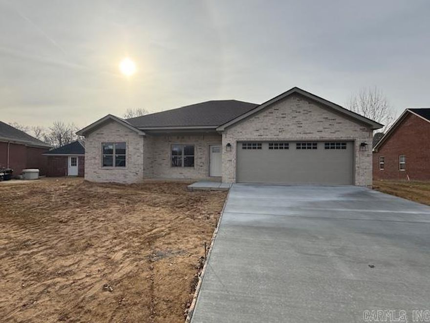 You absolutely will not find a more quiet spot with a brand new home! This home is now occupying one of the only lots left in the popular Wilhelmina Cove. The house backs up to a quiet creek where you will have the privacy behind you and the peacefulness that comes with it. Located at the end of a cul de sac for another bonus. This home will have LVP flooring throughout. Stained maple cabinets with beautiful granite tops in kitchen and bathrooms. A nice patio will be added under the covered porch. Gutters will be added as well. You won't want to miss out on this one!