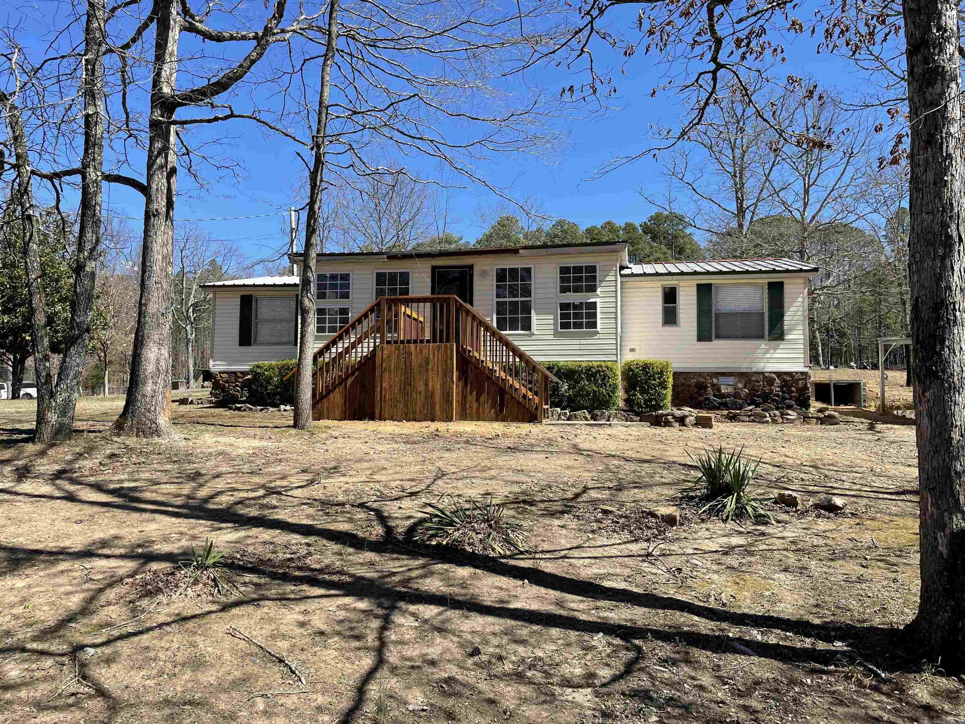 Great country living!! Mobile home has been updated very nicely. New paint, kitchen cabinets, counter tops, flooring and baths have completely been remodeled. 12 X 12 closed in front porch. 10 X 50 Closed in back porch. Old Hickory is a dead end street and the home is close to the end of the road. Peace and quiet living.
