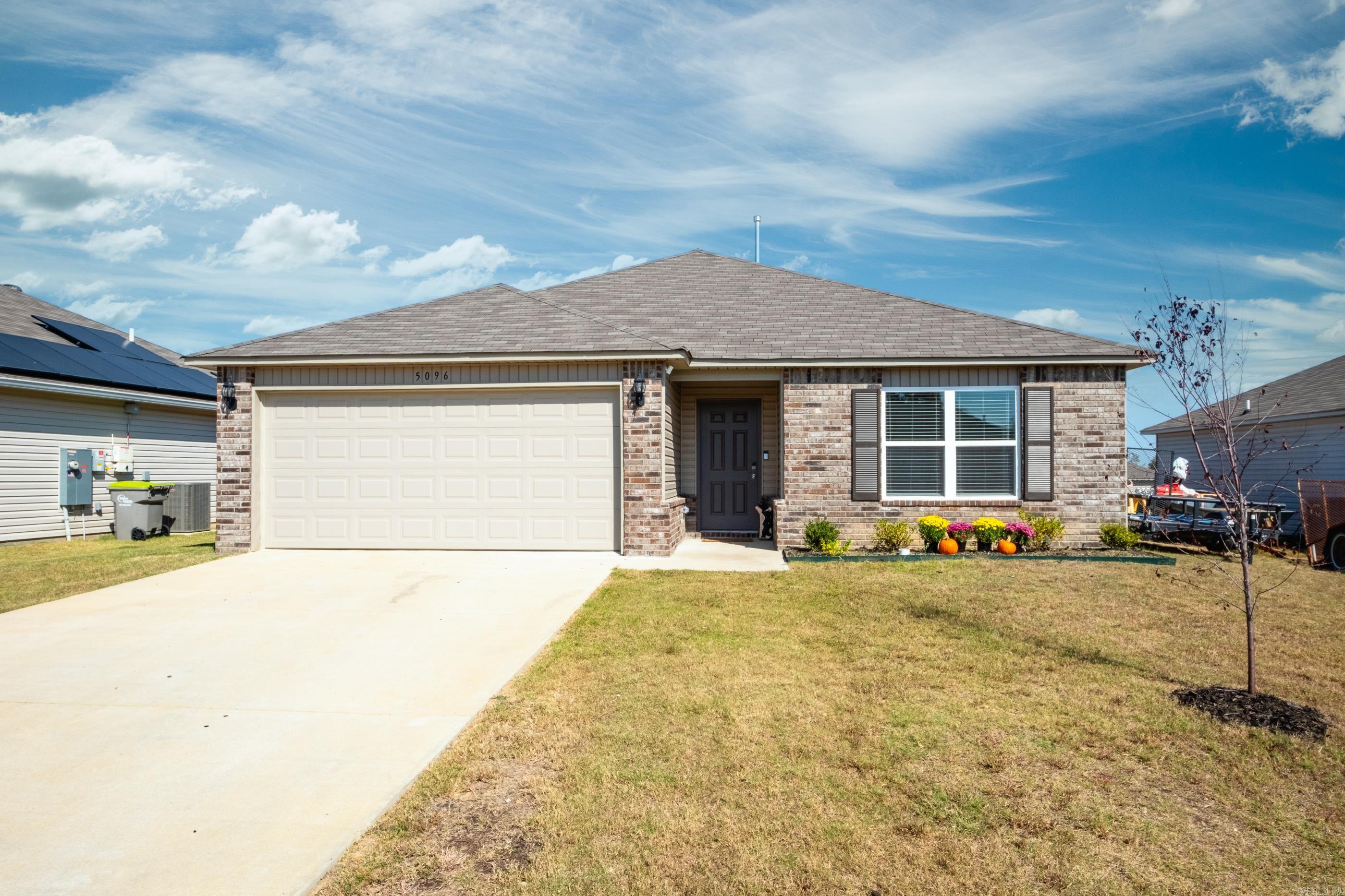 Qualifies for Rural Development 0 Down Loan!   Built in 2023, this incredible home offers so much! Nestled in the heart of Bauxite and local to shopping, dining and more! Beautiful brick exterior with a generous two vehicle garage. Luxury vinyl plank where you need it and comfy carpet where you want it. The kitchen is spacious with an open concept feel for dining and entertaining. Plenty of cabinet space, counter space, a surface stove and stainless-steel appliances for cooking. Separate laundry room for washing clothes. The primary bedroom is very spacious with an ensuite bathroom and walk-in closet. Enjoy backyard BBQ's or morning coffee under your covered patio! The backyard is massive with plenty of room for summer adventures or even a pool. Property falls under the Rural Development Map for zoning. Make your showing appointment today!