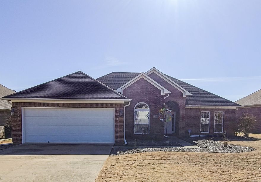 If you are looking for a move-in-ready home in West Conway, this one may be for you!! The tall ceilings in the entry, living and dining areas make the open-concept space feel grand! The beautiful gas fireplace between two windows in the living room provides the perfect setting to cozy up on these cold winter days while the sunshine flows in.   The home is 3-bed, 2-bath with a split floor plan offering a separate dining area, eat-in kitchen, laundry room, and covered back porch perfect for backyard entertaining!