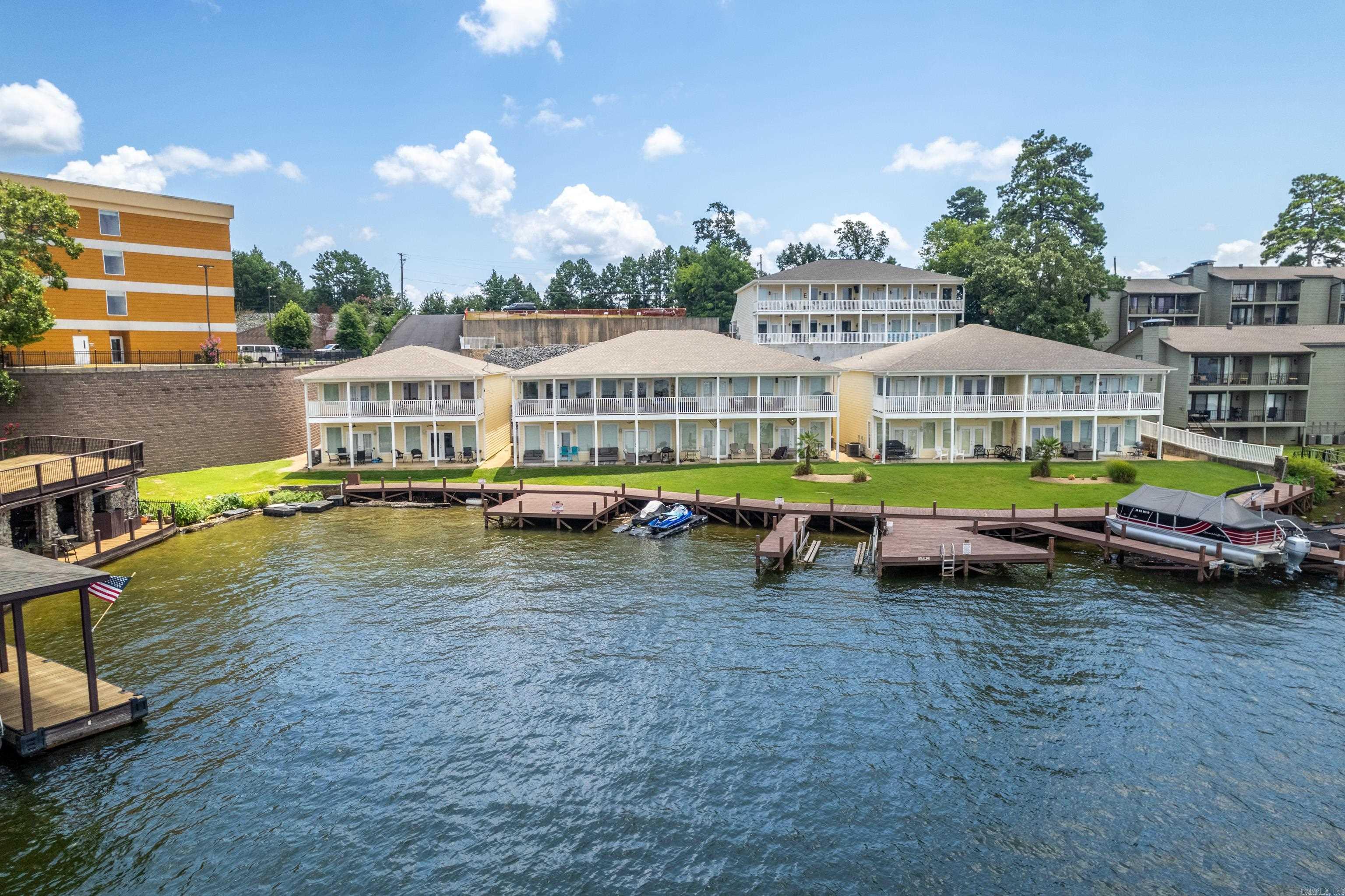 Enjoy breathtaking water views from this beautiful lakefront condo, perfectly positioned for both personal relaxation and income potential. This unit features an open concept layout, updated finishes, and a private balcony overlooking the lakeāideal for morning coffee or sunset cocktails. Located in a desirable community with an expansive boardwalk and swim dock. Approved for short-term rentals, this property on Seven (7) South is close to everything, less than five miles to Oaklawn Racing Casino Resort and a short distance to downtown Hot Springs, Arkansas. Whether you're looking to invest or unwind, this condo delivers the best of both worlds!