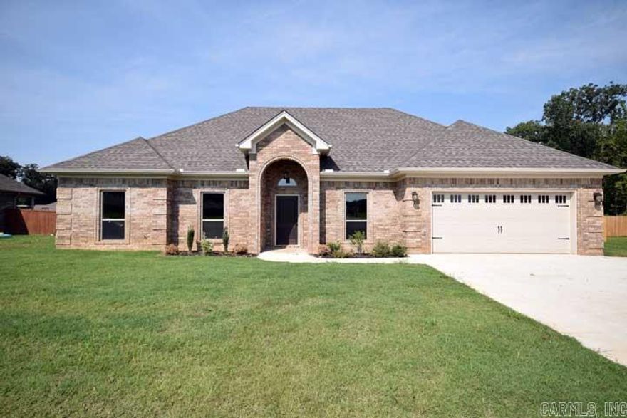 This house is great! Beautiful Stained cabinets, Granite counter tops, Stainless steel appliances, Gorgeous glass backsplash and a great breakfast bar. The living room is huge with a fireplace, and beautiful had hardwood floors. The master suite has a pan ceiling, big closet with built in dresser! The master bath has two marble vanities, Jetted tub and separate shower! Three more large bedrooms.The covered back porch is awesome and the yard is fully fenced! Come see!