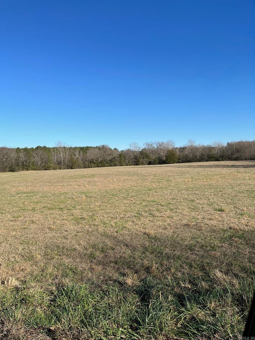 Excellent homesites or development property. Mostly pasture with about 13 acres wooded, beautiful year round creek, paved road frontage & all utilities available