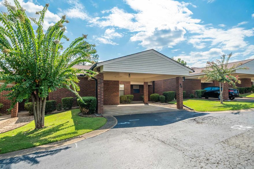 Retirement community in a great central location just minutes to shopping, hospitals and restaurants. Many updates done recently!  Fresh paint and new floors in addition to new dishwasher & microwave.  Air conditioner replaced in 2023, Hot water heater in 2019, outside awning in 2023. All appliances stay including washer and dryer.  Relax and enjoy your back patio area with lots of privacy. Don't miss this great buy.