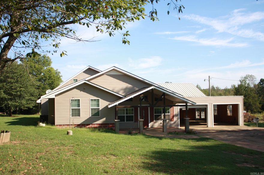 5 Bedrooms, 2 full baths  situated in rural setting, approx. .562 acres.  Central AC/ Heat.  Large covered decks overlooking property. Listing Agent: Melinda Bennett - 870 451 2226