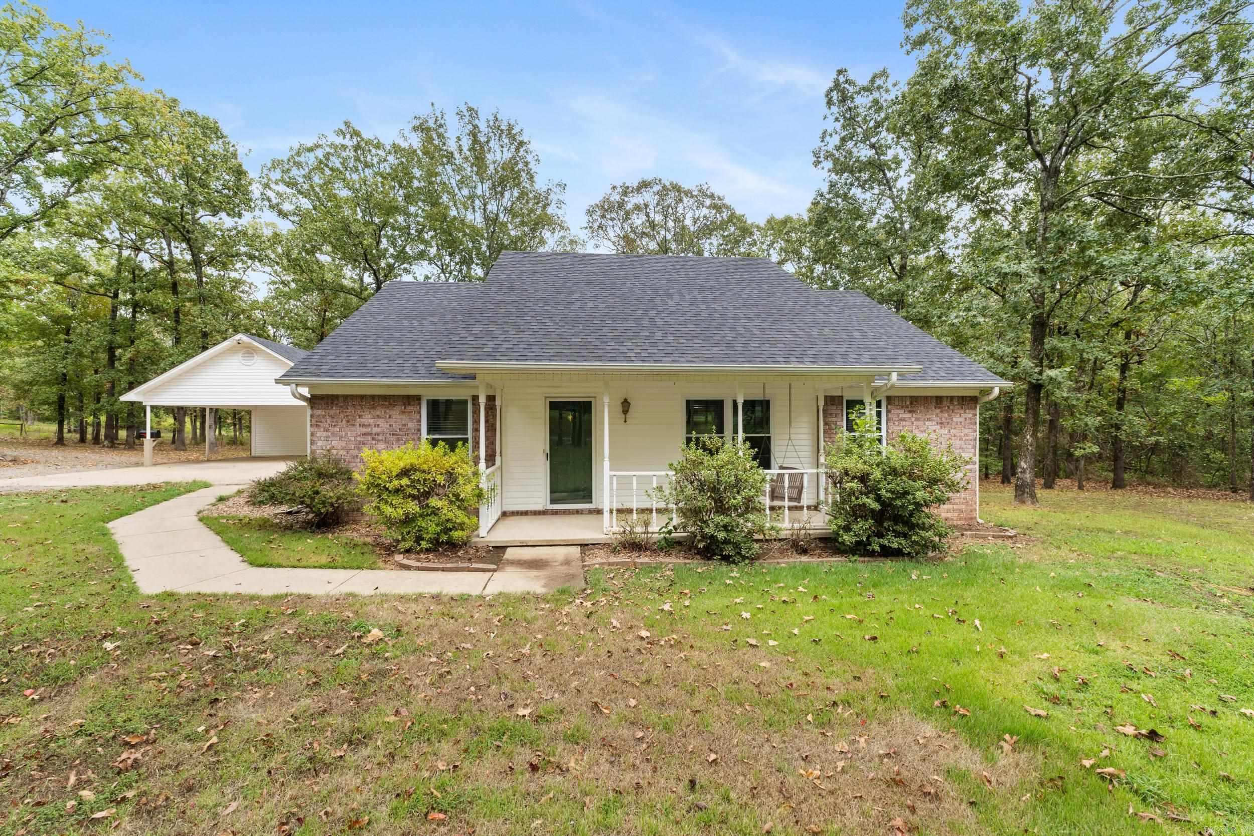 Have you ever dreamed of living on acreage while still being just minutes from the city? Here's your chance!!!!! This 3 bedroom, 2 bath home is located just 5.6 miles from the Toad Suck river bridge and 12 minutes from the Conway (Dave Ward Dr.) WalMart. The property has been meticulously cared for and is ready for new owners to make it their own. A few rooms have been freshly painted and the exterior has had a recent powerwash to make it nice and clean! The living room is cozy with the charming brick fireplace and vaulted ceilings. The kitchen has been updated over the years with white cabinetry and dark gray appliances. Another great feature is the oversized laundry/mud room. There is ample storage and places to put all of your things after spending time outside enjoying the 5 acres of land! The front yard features a convenient circle driveway! Don't miss the huge storage room attached to the double carport. This home will check all of your boxes. Call today to take a look!
