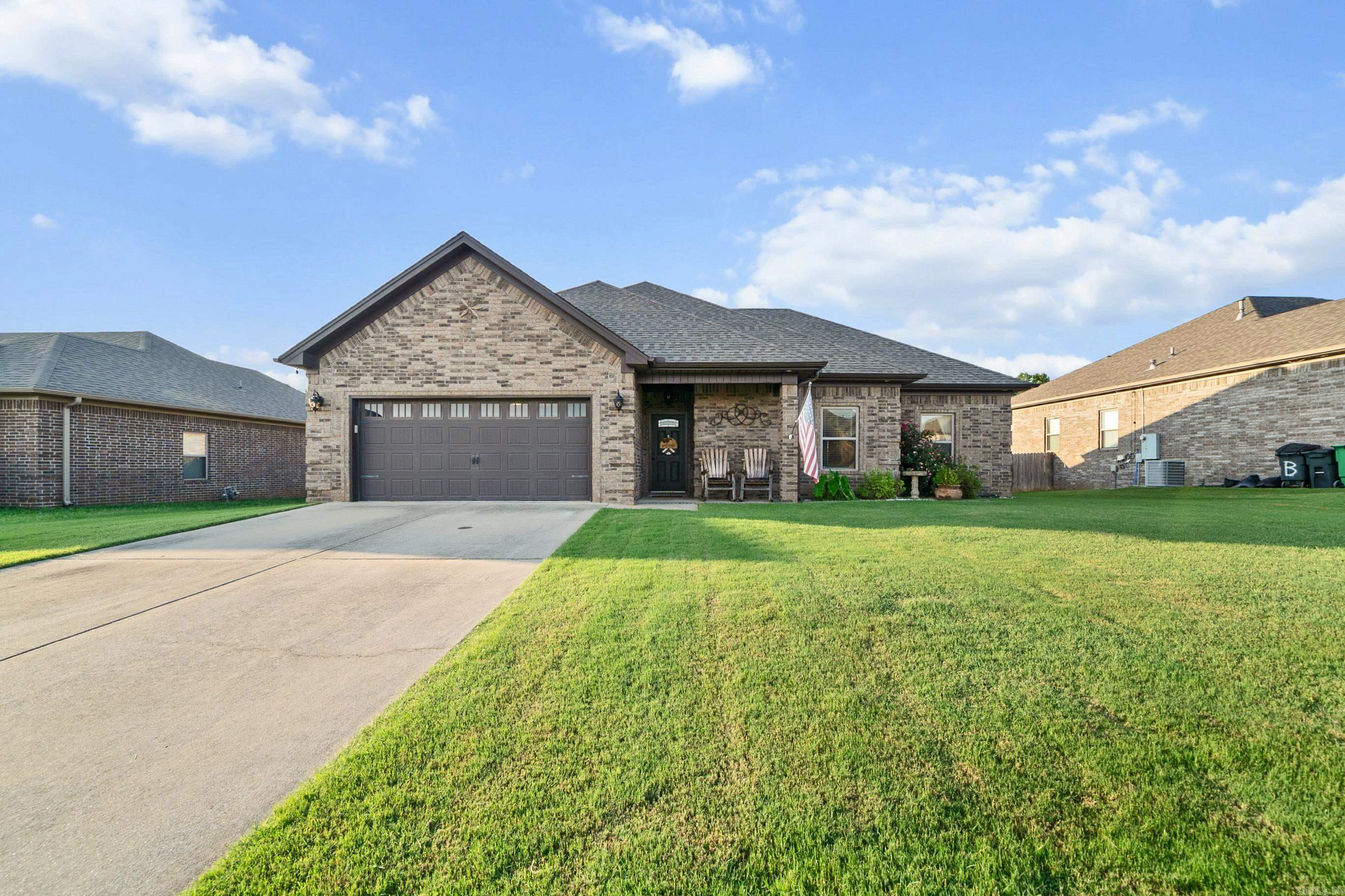 Welcome to this beautifully maintained property where style meets functionality. Step inside to discover low maintenance LVP flooring that offers elegance and durability. The kitchen and bathrooms have beautiful granite countertops and tons of storage. The open concept floorplan flows seamlessly to create a bright and inviting atmosphere perfect for family time and entertaining. This home has 4 bedrooms and 2 full baths perfect for guests or a home office. The backyard is a true highlight with perfectly manicured grass offering generous space for outdoor enjoyment with a concrete pad ready for pool or additional outdoor seating. For added piece of mind, there is a built in storm shelter located in the garage. This home has a new roof and new water heater. This one owner home is a must see! Call your favorite agent to book a showing.