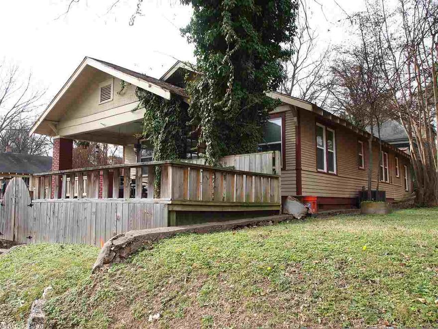 Nice updates include kitchen and bath, windows throughout, fixtures and new heat and air, all electric. This home features nice hardwood floors and tile. The new LG washer and dryer convey. Closet system in back room conveys. Double oven, Built ins and french doors, breakfast bar, nice covered front porch with State Capitol view. Privacy fenced in yard. Storage shed stays. Separate dining room. New front and back door. Great for first time home buyer, investor, UAMS student or employee.