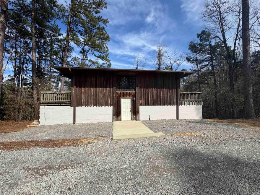 Want a secluded home close to town ? This is it! 3 beds 2 bath split level home, large laundry room, two large bedrooms downstairs and large bathroom with huge walk in closet. Upstairs boast large windows with sliding door to your own private balcony, open concept living, dinning, and kitchen plus master bedroom with private bathroom and its own access to separate balcony. New guttering and rock driveway Taxes and acreage taken from courthouse records Square foot measuring encouraged