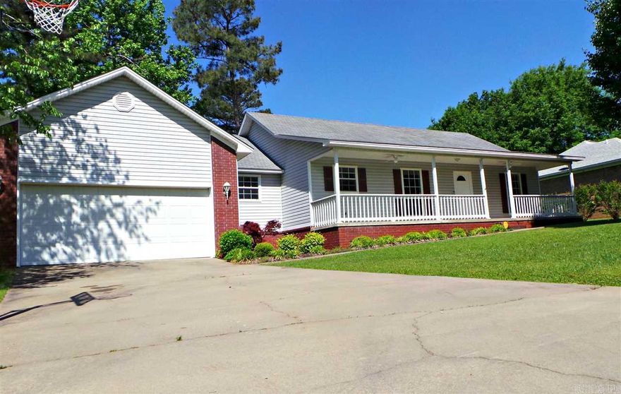 Adorable house in quite neighborhood! Unbeatable curb appeal with it's big front porch and brick/siding combo! New paint throughout & newer tile in kitchen. With the neighborhood, good sized fully fenced back yard, & covered porches it's very family friendly! Large kitchen with bar and tons of cabinets, fireplace, big two car garage with 10ft ceilings, great split floor plan, massive walk-in closets, high vaulted ceilings in living room & master bedroom: With this price & these amenities it won't last long!