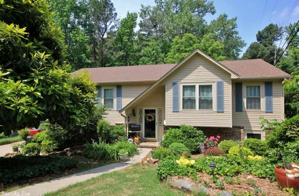 Lovely setting, lush landscaping, storm/tornado shelter, private backyard and maintenance free siding, like new windows, new gas range and microwave. 4 bedrooms, 3 baths, separate living areas.