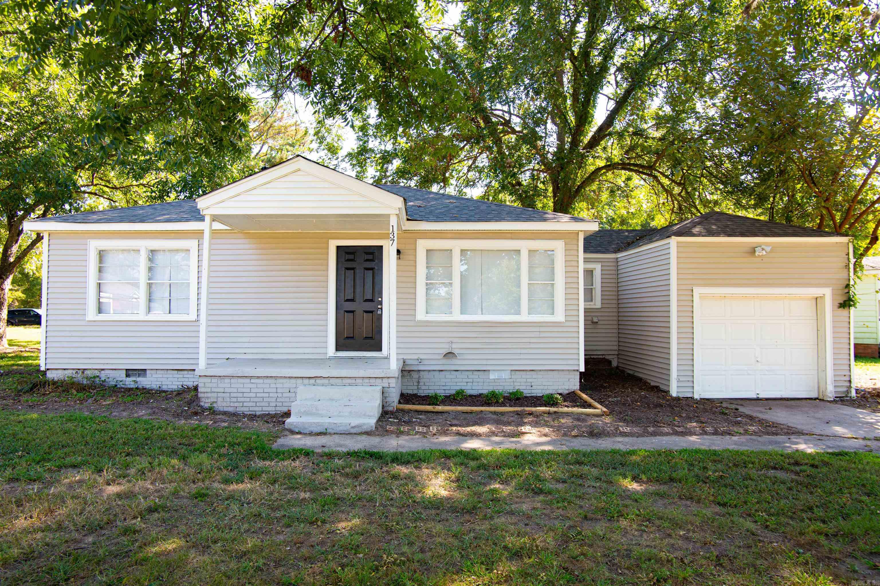 Looking for a move-in ready home. beautifully rehabbed ranch style home in North Little Rock is perfect for families or first-time homebuyers. Nestled on a large lot, this two-bedroom, one bathroom gem offers a seamless blend of modern luxury and comfortable living. Agents see remarks. Tenant occupied 24-hour notice for showing.