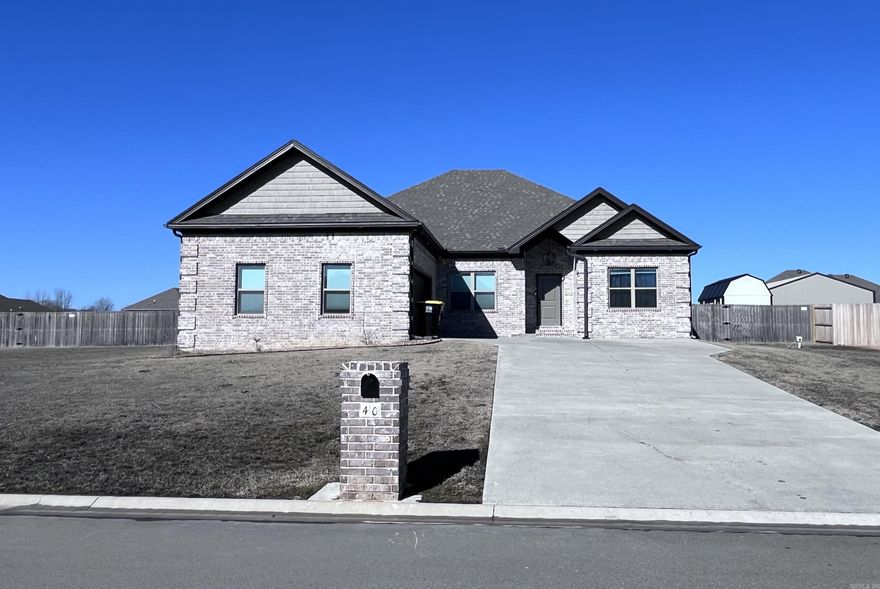 GORGEOUS 4 bedroom, 2 bathroom all brick house in the highly desired Mt. Tabor Estates subdivision.  High ceilings and laminate flooring throughout the house. Open concept living room with oversized ceiling fan and gas fireplace. Farmhouse kitchen sink, stainless steel appliances, tons of cabinet space and top-of-the-line refrigerator included! Exceptionally large master closet with island style dresser! Another bedroom closet is so deep that a portion is being used as an office area! Laundry room with countertop and cabinetry and separate mudroom with storage selves and built in's. Privacy fenced backyard with large, covered patio and a storage shed. This house has it all AND SO MUCH MORE!