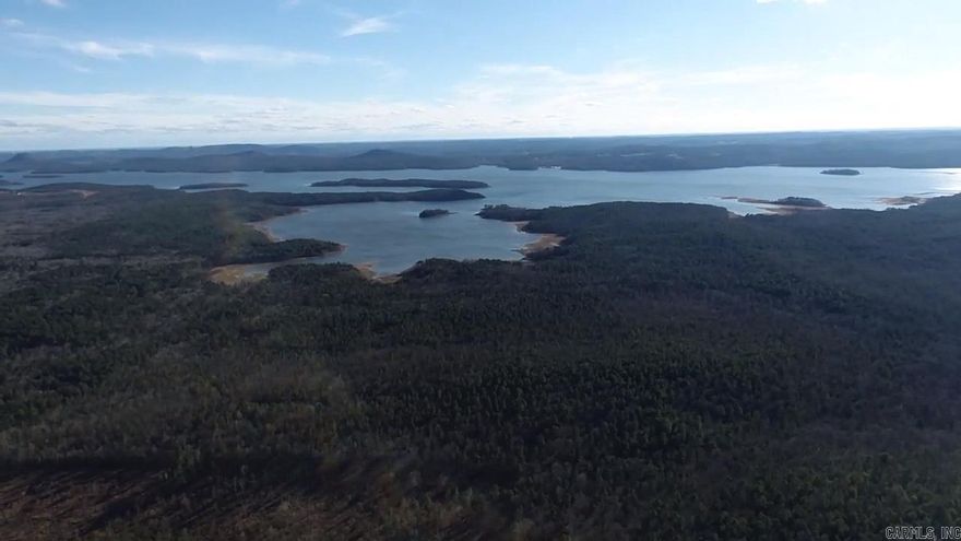21 Acre property with beautiful lake and mountain views off Highway 300 near Little Rock.
