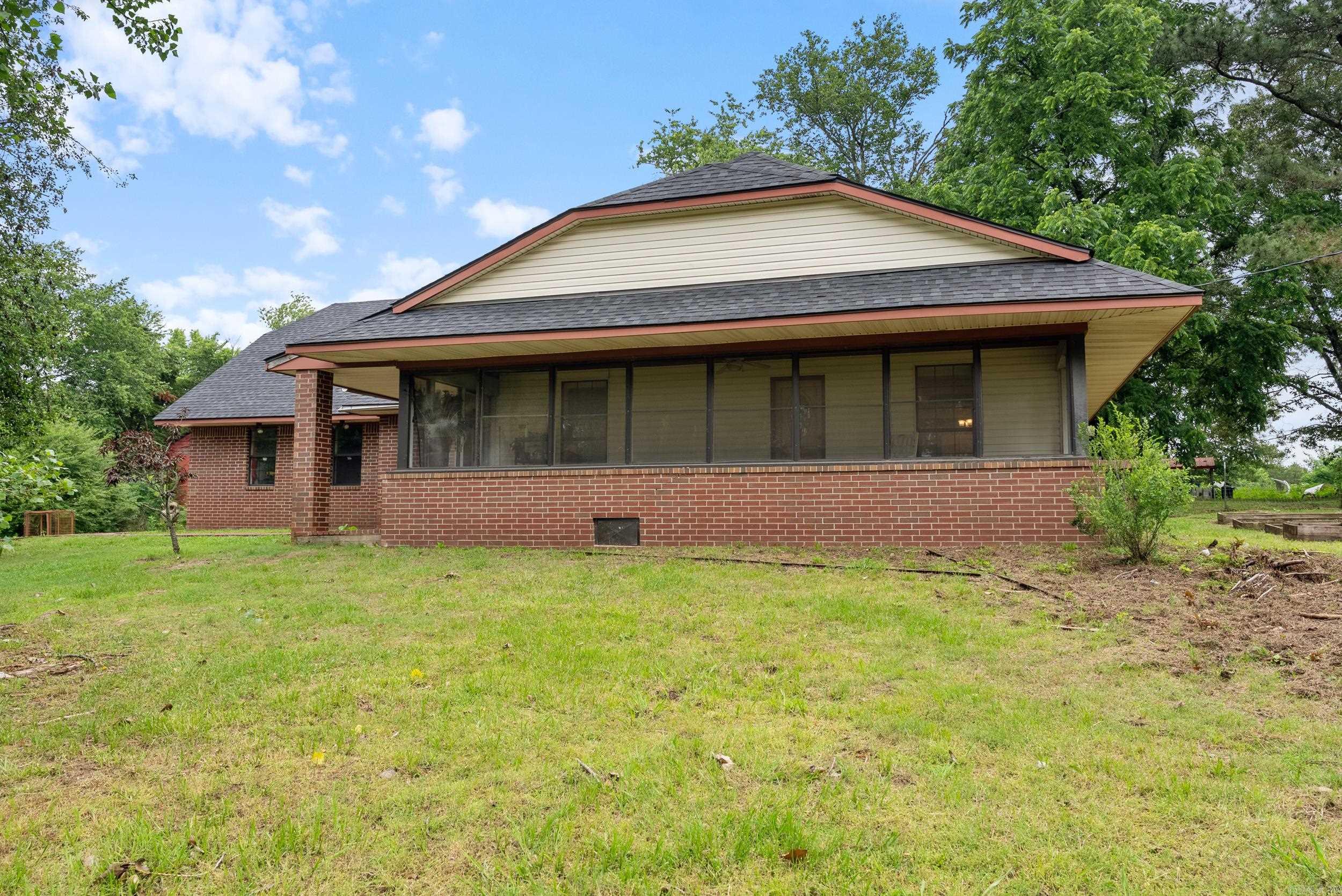 Updated Home on 10+ Acres with Barn & Shop! Located in Top Rated Greenbrier School District, nestled on over 10 peaceful acres, this beautiful home was COMPLETELY renovated down to the studs and offers 3 bedrooms, 2.5 bathrooms & a spacious 2,363 sqft of living space. The open floorplan is perfect for entertaining. You will love relaxing on the huge screened-in front porch. Updates include NEW roof, NEW water heater, NEW plumbing, NEW electrical, NEW floor joists and extra support added, NEW LVP flooring, NEW interior paint, NEW light fixtures, popcorn ceilings scraped, NEW appliances, and NEW kitchen countertops coming soon! The 30 x 30 shop has electricity and a 12 ft lean to. You’ll enjoy breathtaking views of farmland, sunrises, wildlife and plenty of fruit trees. This property offers serenity and space to enjoy the outdoors, so don’t miss this rare find and schedule a tour today! Agents see remarks.