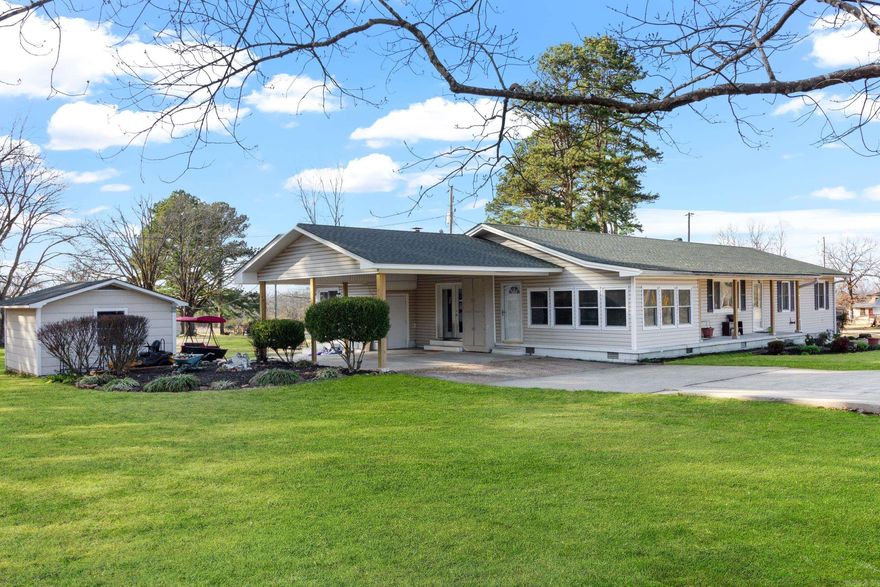 Gorgeous home with circle drive setting on over 5 acres just outside of Searcy city limits! This home features 3 beds, 2 baths, 2 separate living areas; one with a beautiful wood burning fire place. There is also a radiant sunroom perfect for all seasons. The roof, HVAC, and water heater are all less than three years old and the home has fresh paint throughout. The master bath is totally updated with a large walk in shower with plenty of space for a shower bench as needed and double sinks. Both full baths have new counter top height vanities. Oh and did I mention all new windows through out this home?! There is also a 15x20 separate building matching the homes exterior. AND there is a cellar perfect for those stormy days. There are also new french doors to welcome new owners. Looking out on the 5.48 acres is a beautiful view with 2/3 of the back property fenced. The HUGE backyard has a brand new privacy fence with a picket fence sitting area. There is a deer stand and feeder that will stay with the property perfect for those that love to hunt! Come take a look  *There is separate septic and utilities on the property perfect for an in law quarter to be built if wanted in the future.