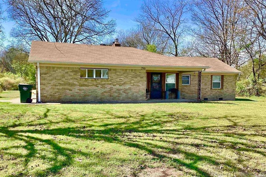 This well-built brick home featuring real hardwood flooring, cozy fireplace with insert, eat in kitchen, 3 ample sized bedrooms, updated bathroom with walk in shower, large stand-alone storage building, level lot with fenced front yard and a garage is conveniently located close to schools, downtown, and the bypass. A rare find in Cutter Morning Star School District, a great starter home or place to settle down, this home has new appliances. Survey available.