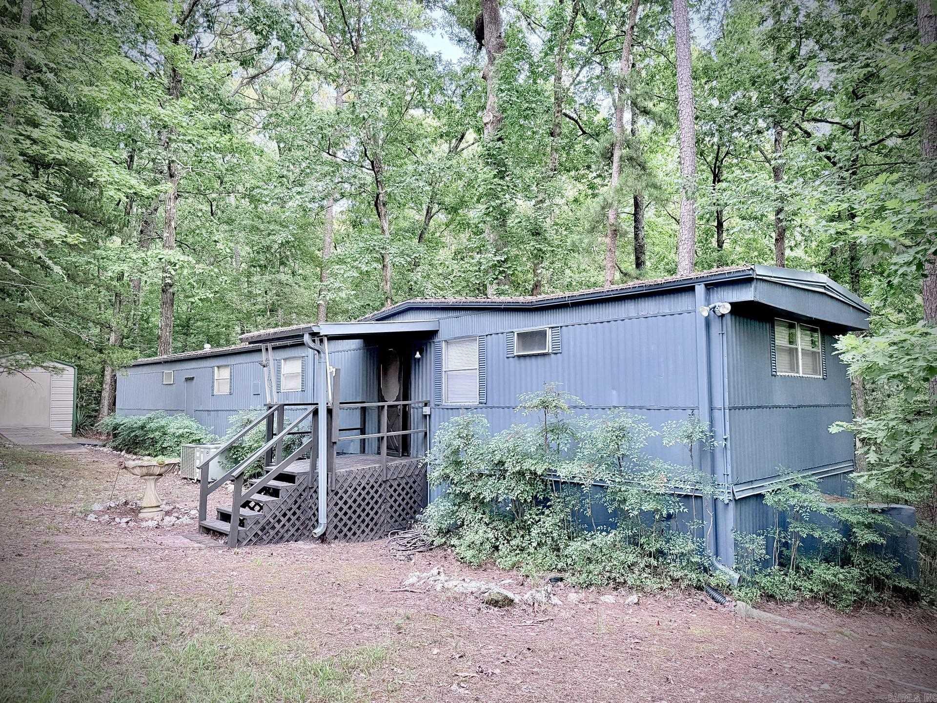 This charming single family home located at 69 Circle T Rd in Mount Ida, AR was built in 1973 and offers a cozy living space with a total of 924 sq.ft. The 3BR home features 1 full bathroom and 1 half bathroom, providing convenience for residents and guests. Situated on a spacious lot, this property offers ample outdoor space for recreational activities or gardening. With its well-maintained interior and peaceful surroundings, this home is the perfect retreat for those seeking a peaceful and comfortable living environment near Lake Ouatchita.