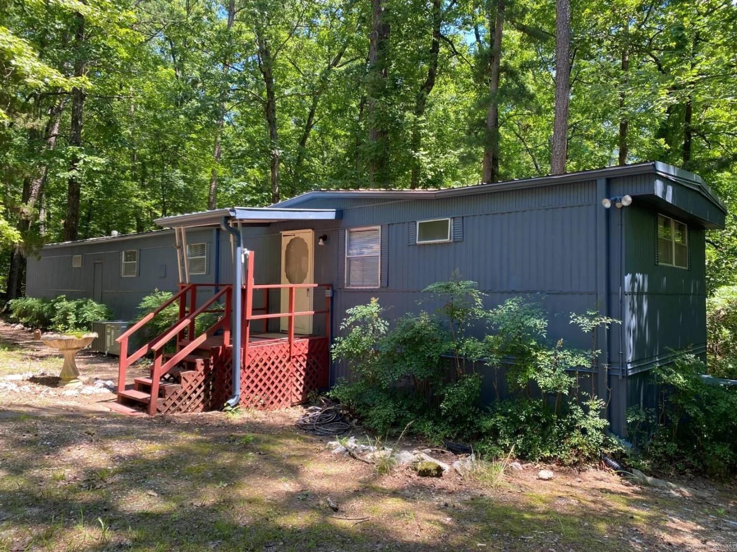 This charming single family home located at 69 Circle T Rd in Mount Ida, AR was built in 1973 and offers a cozy living space with a total of 924 sq.ft. The 3BR home features 1 full bathroom and 1 half bathroom, providing convenience for residents and guests. Situated on a spacious lot, this property offers ample outdoor space for recreational activities or gardening. With its well-maintained interior and peaceful surroundings, this home is the perfect retreat for those seeking a peaceful and comfortable living environment near Lake Ouatchita.