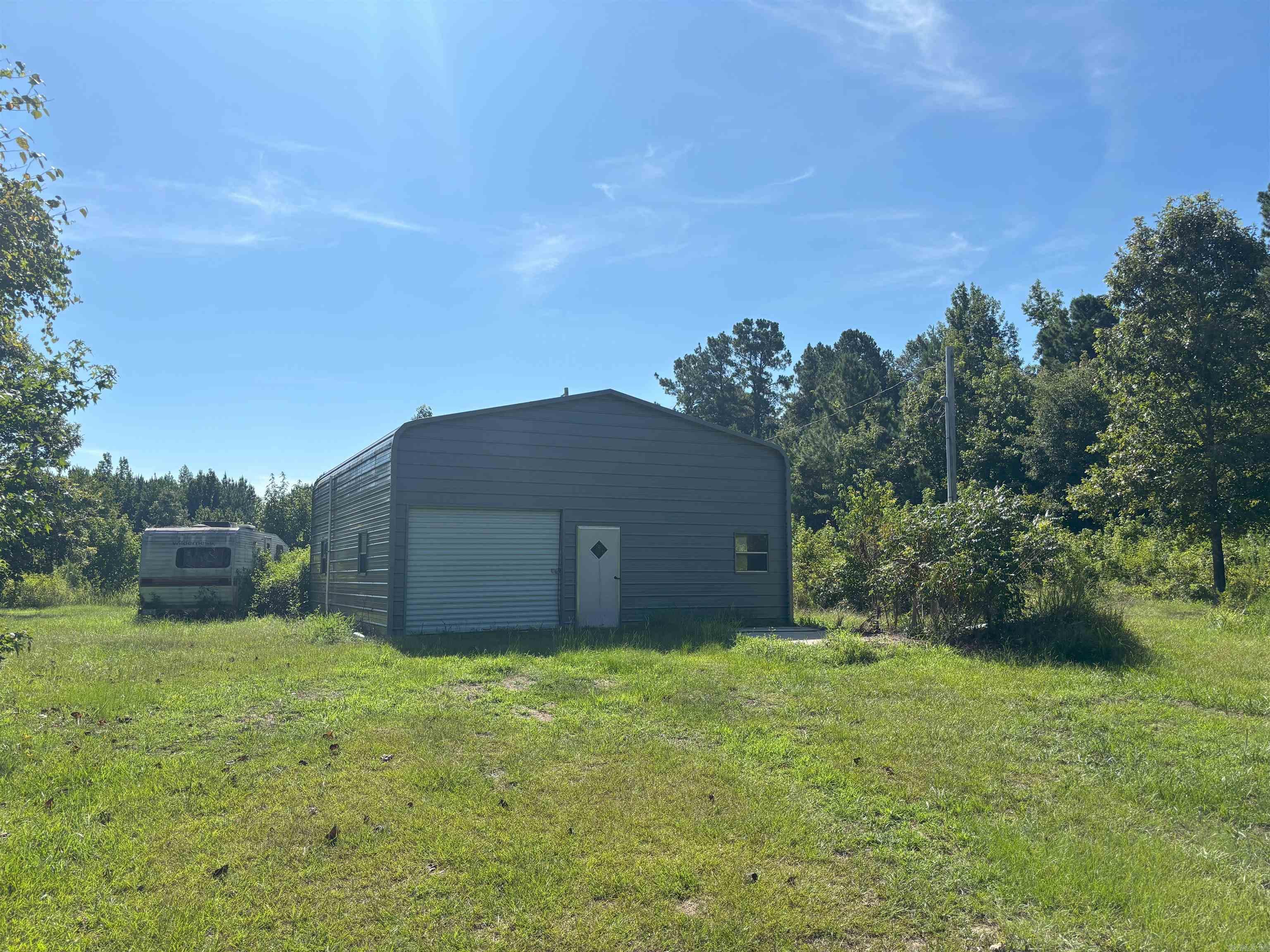 This 62 acre property is a hunters dream! Located just about 15 minutes away from Warren, and about 10 minutes from New Edinburg, it offers very seclusive living or camping while still being close to town. The wildlife on this property is outstanding, with deer, turkeys, and hogs present. This property is located just 1 mile South of the Hill Creek Barrens Natural Area WMA offering more great hunting, and also Crane Lake is approx. 4 miles away offering great fishing. The 1 bed, 1 bath metal building on the property offers to be an exceptional hunting camp. It is plumbed with rural water and it also has electricity as well as a septic tank installed. It is not finished out but there has been work done on the inside. (see pics) Call Josh Nichols with White Oak Realty today to check this fine property out!