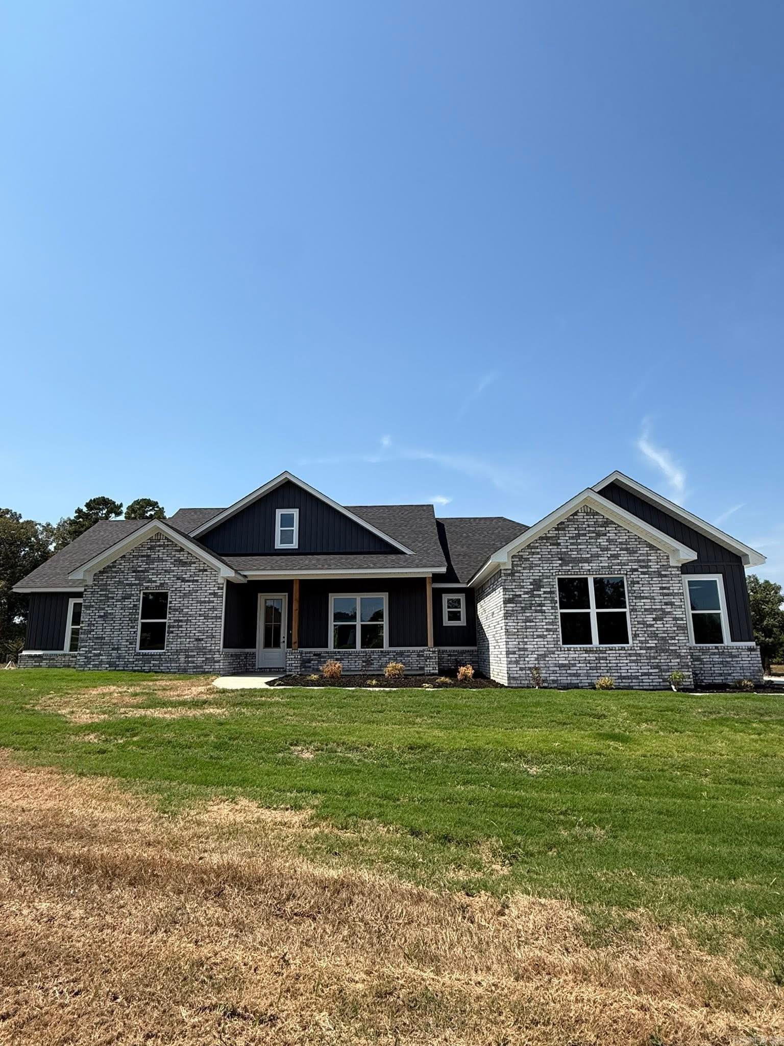 Welcome to a Beautiful new home in a favorite area!! Bauxite schools or school choice. Country atmosphere on almost 4 acres. 4 beds 2 1/2 bath. Master bath has a large soaking tub for the long days. Bright kitchen and living area with large pantry. Quartz counter tops. This property has endless potential- perfect for outdoor living,gardening, or future expansion. Flat lot With the combination of acreage space, and functional layout , this home is a rare find .